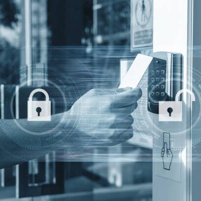 Hand using security key card unlocking the door to entering private building . Home and building security system